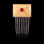 Gold envelope haircomb